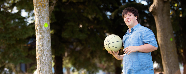InVision Stock Man Playing Basketball Outside