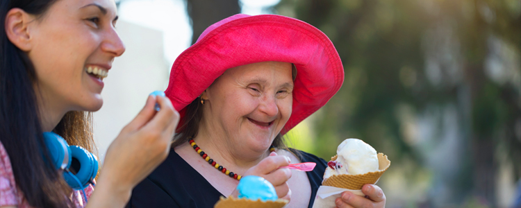Two Women in Community Eating Ice Cream